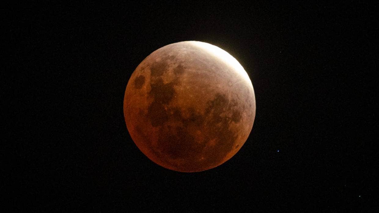 Blood micromoon seen across NZ during historic partial lunar eclipse 1